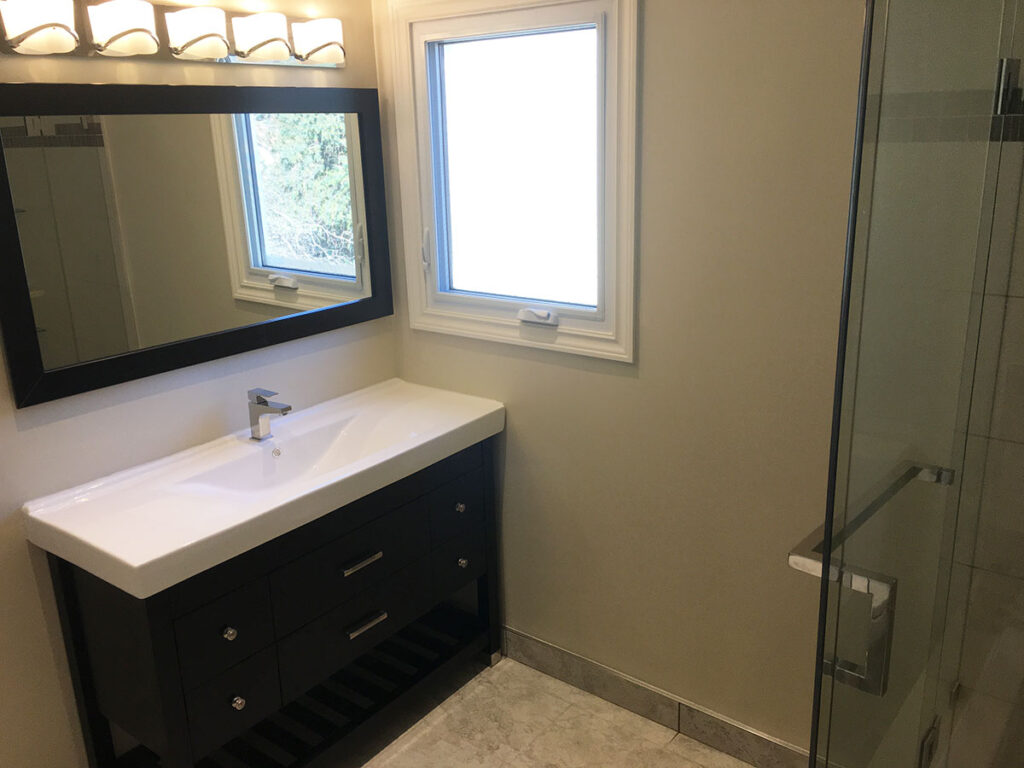 Bathroom Fully Porcelain Tile Relocated Ventilation New Lighting Design