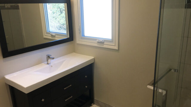 Bathroom Fully Porcelain Tile Relocated Ventilation New Lighting Design